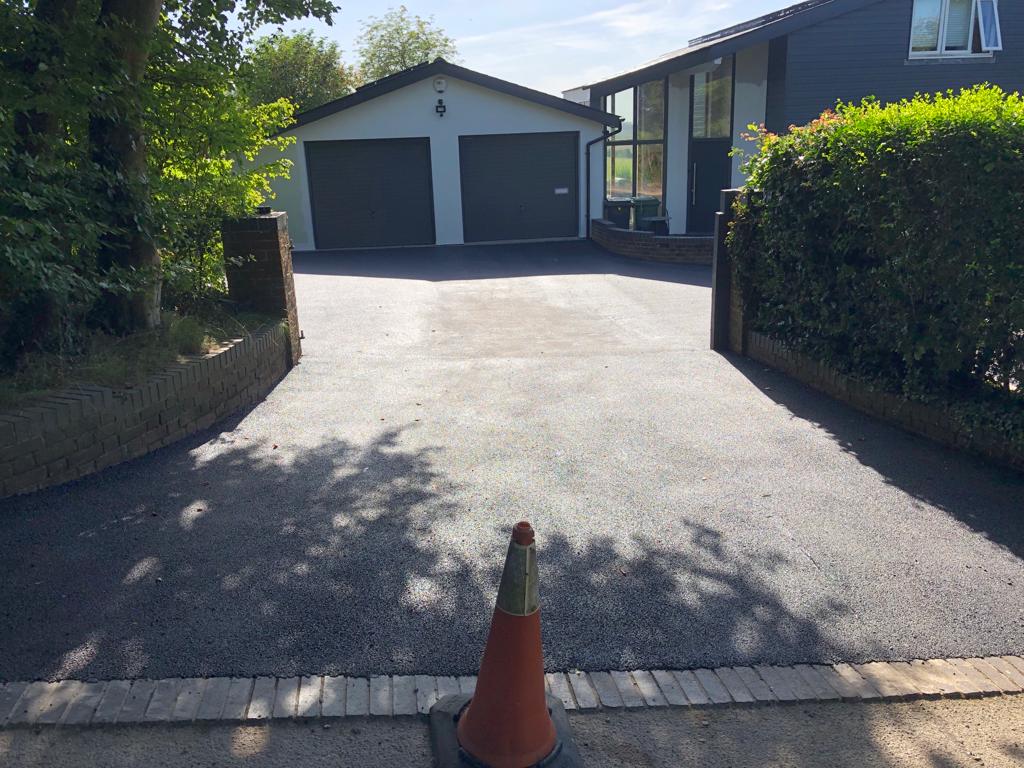 This is a photo of a bitumen driveway which is in the process of being installed by Heatherton Road Tech