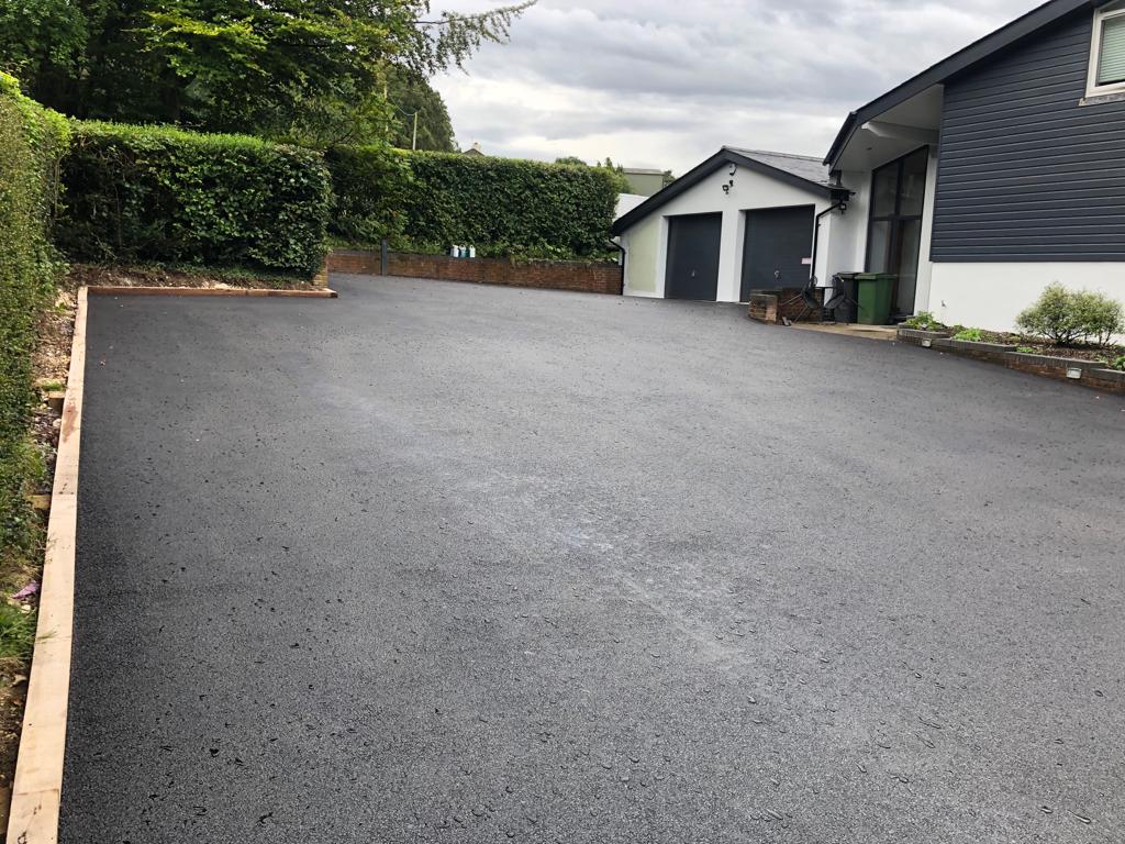 This is a photo of a asphalt driveway which is in the process of being installed by Heatherton Road Tech