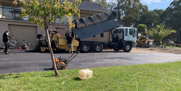 This is a photo of an asphalt driveway which is in the process of being installed by _Heatherton Road Tech